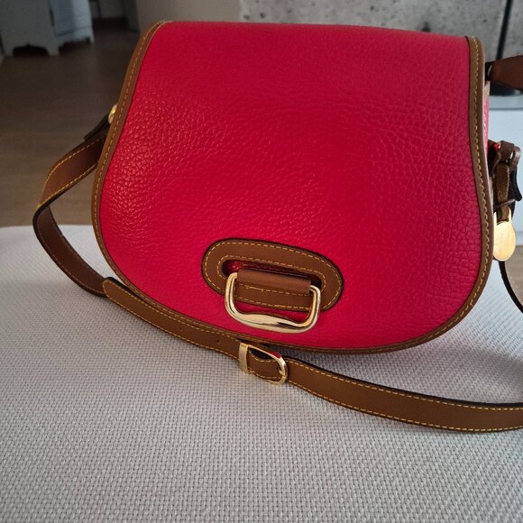 Dooney and Bourque crossbody leather bag. - Picture 2 of 8